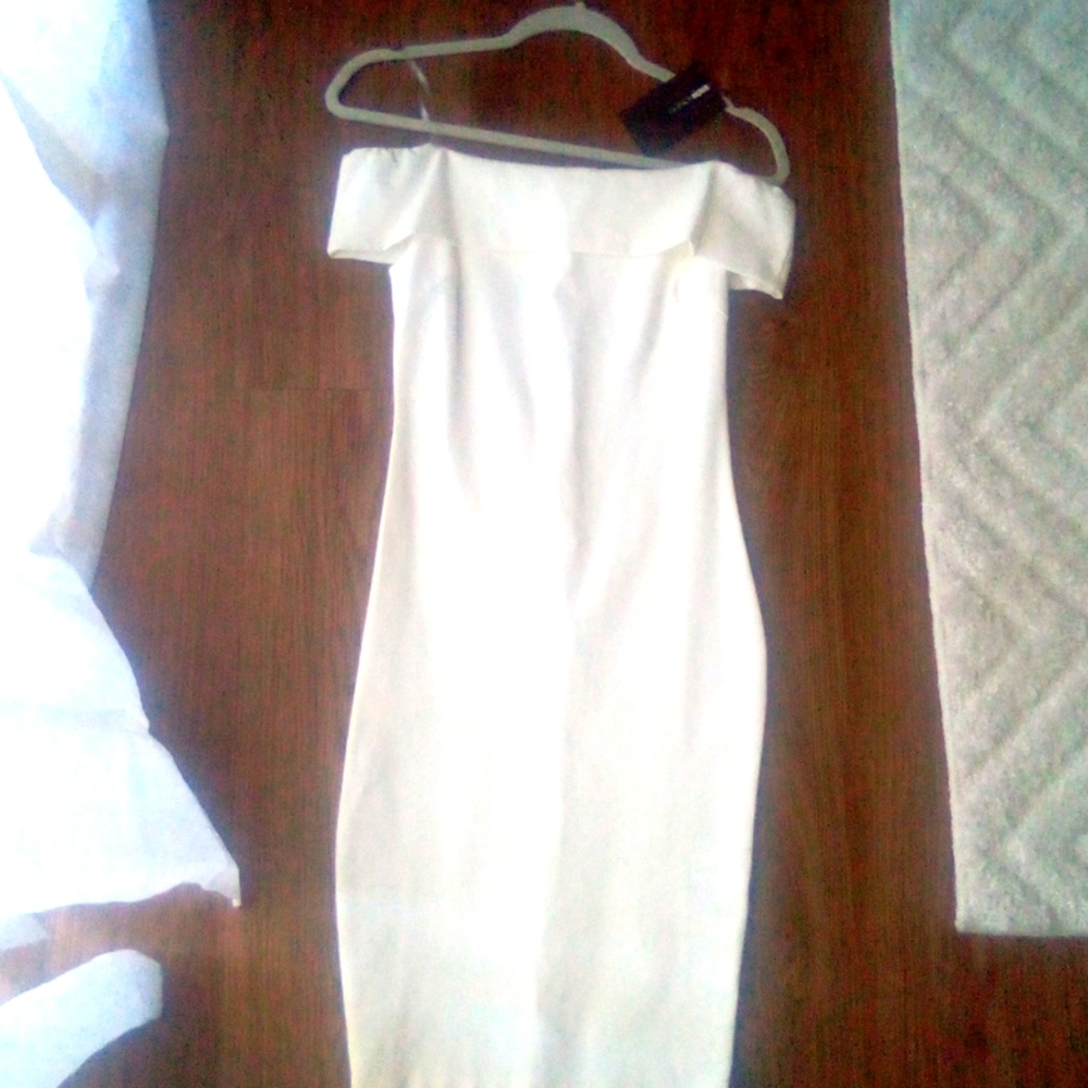 White body gripping dress